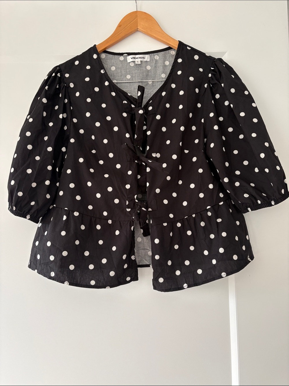Vigoss Black and White Polka Dot Tie-Front Peplum Blouse